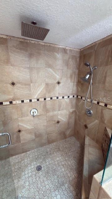 633 Spring Oaks Boulevard Altamonte Springs, FL 32714 - Photo 19 of 37 a bathroom with shower