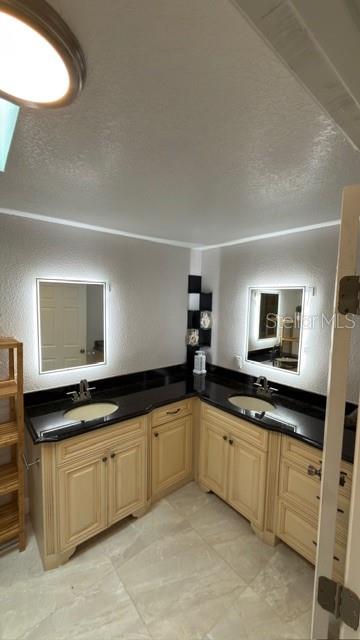 633 Spring Oaks Boulevard Altamonte Springs, FL 32714 - Photo 20 of 37 a kitchen with granite countertop a sink and cabinets