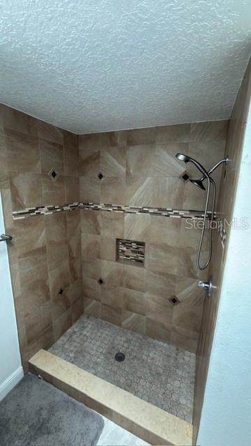 633 Spring Oaks Boulevard Altamonte Springs, FL 32714 - Photo 26 of 37 a bathroom with a shower