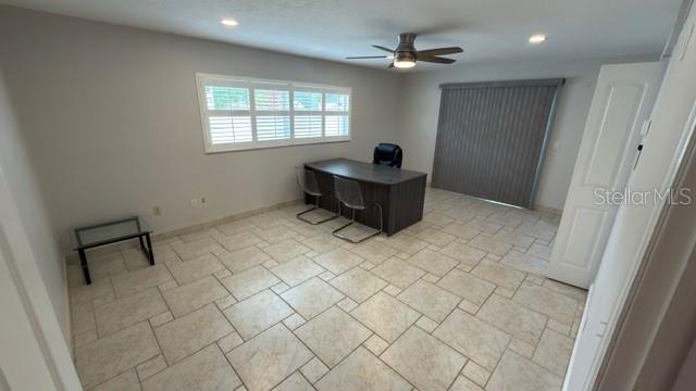633 Spring Oaks Boulevard Altamonte Springs, FL 32714 - Photo 30 of 37 a living room with furniture and a window