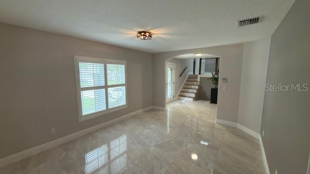 633 Spring Oaks Boulevard Altamonte Springs, FL 32714 - Photo 4 of 37 a view of an empty room with a window