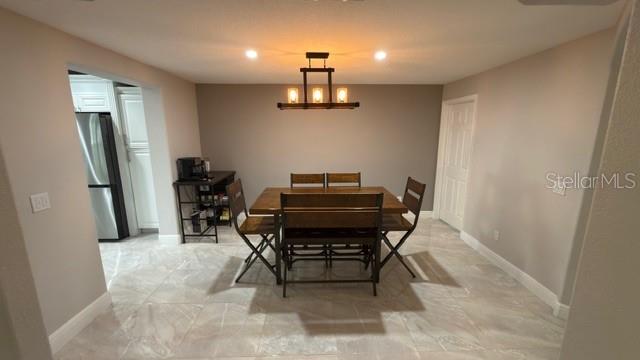 633 Spring Oaks Boulevard Altamonte Springs, FL 32714 - Photo 6 of 37 a view of a hallway with chairs