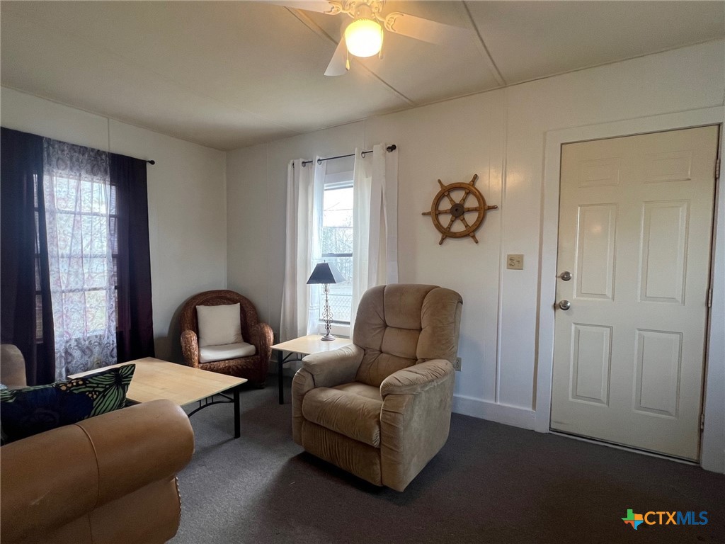 327 West Main Street Port Lavaca, TX 77979 - Photo 9 of 11 a living room with furniture and window