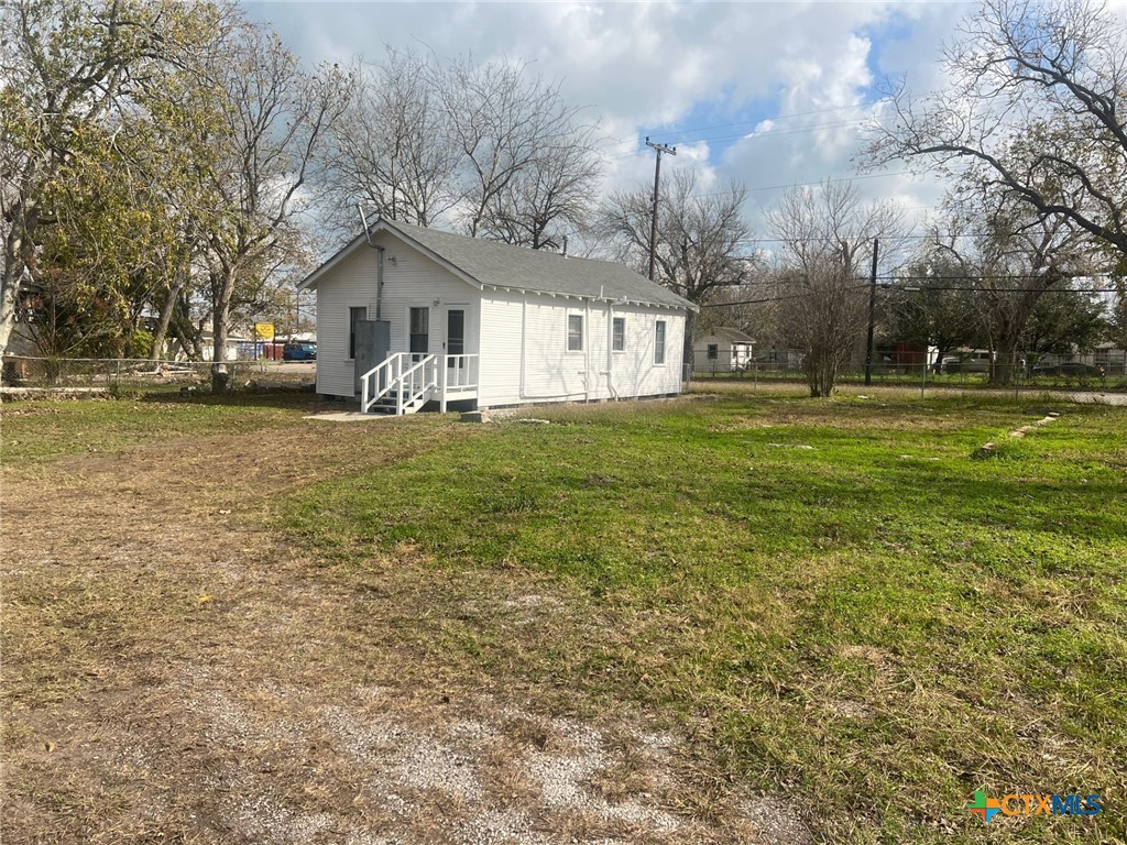 327 West Main Street Port Lavaca, TX 77979 - Photo 10 of 11 a front view of house with yard and green space