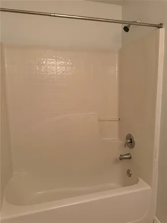 a close view of a bathtub in bathroom