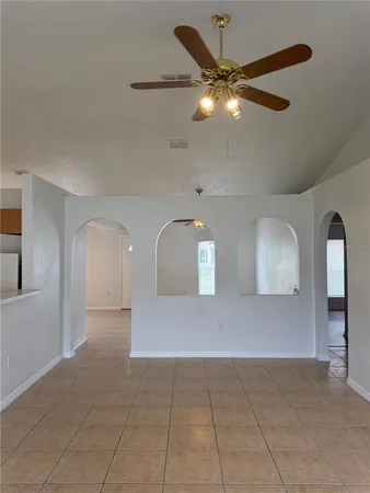 a view of a livingroom with a ceiling fan