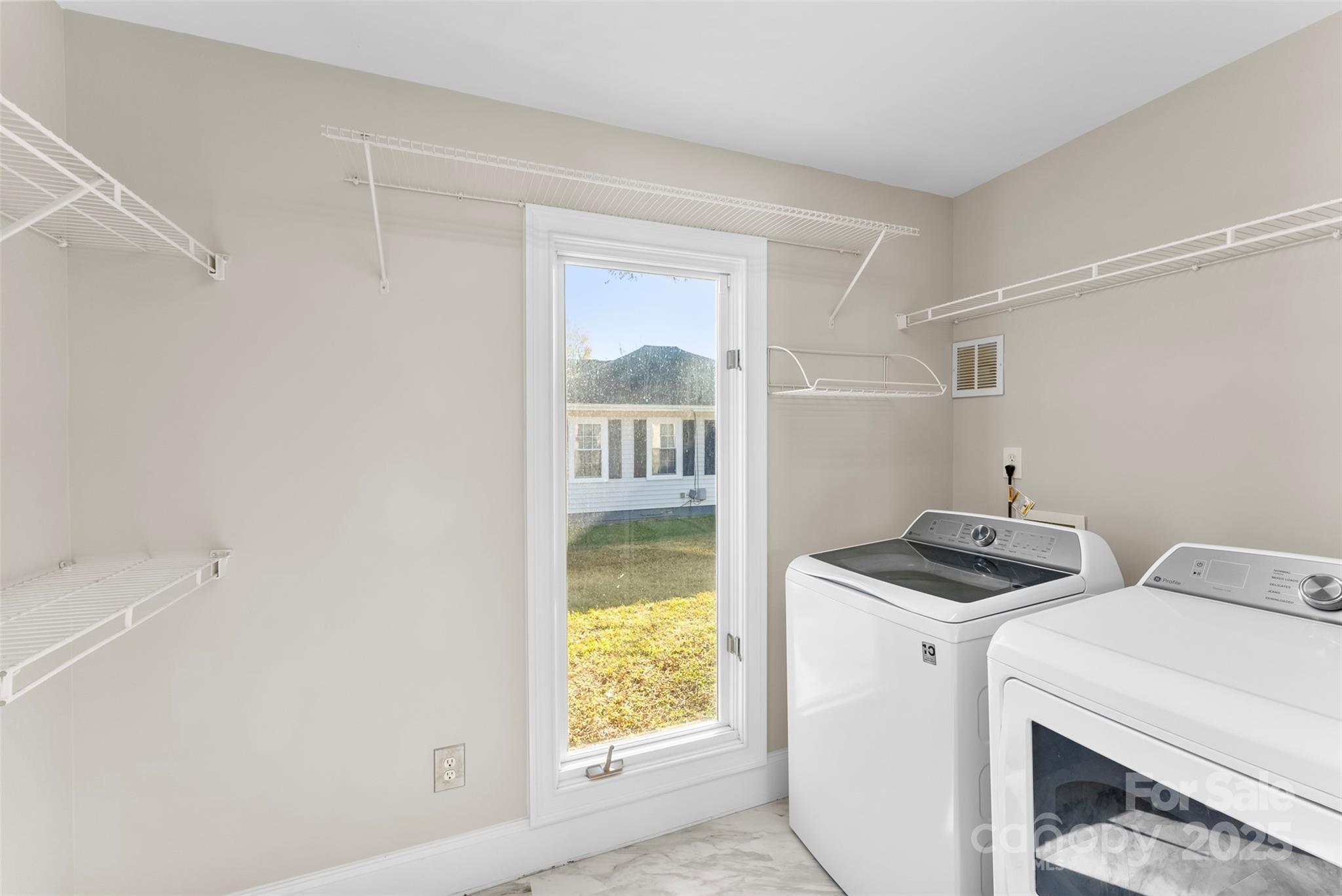 909 South Main Street Clover, SC 29710 - Photo 13 of 26 a bedroom with a bed and a window