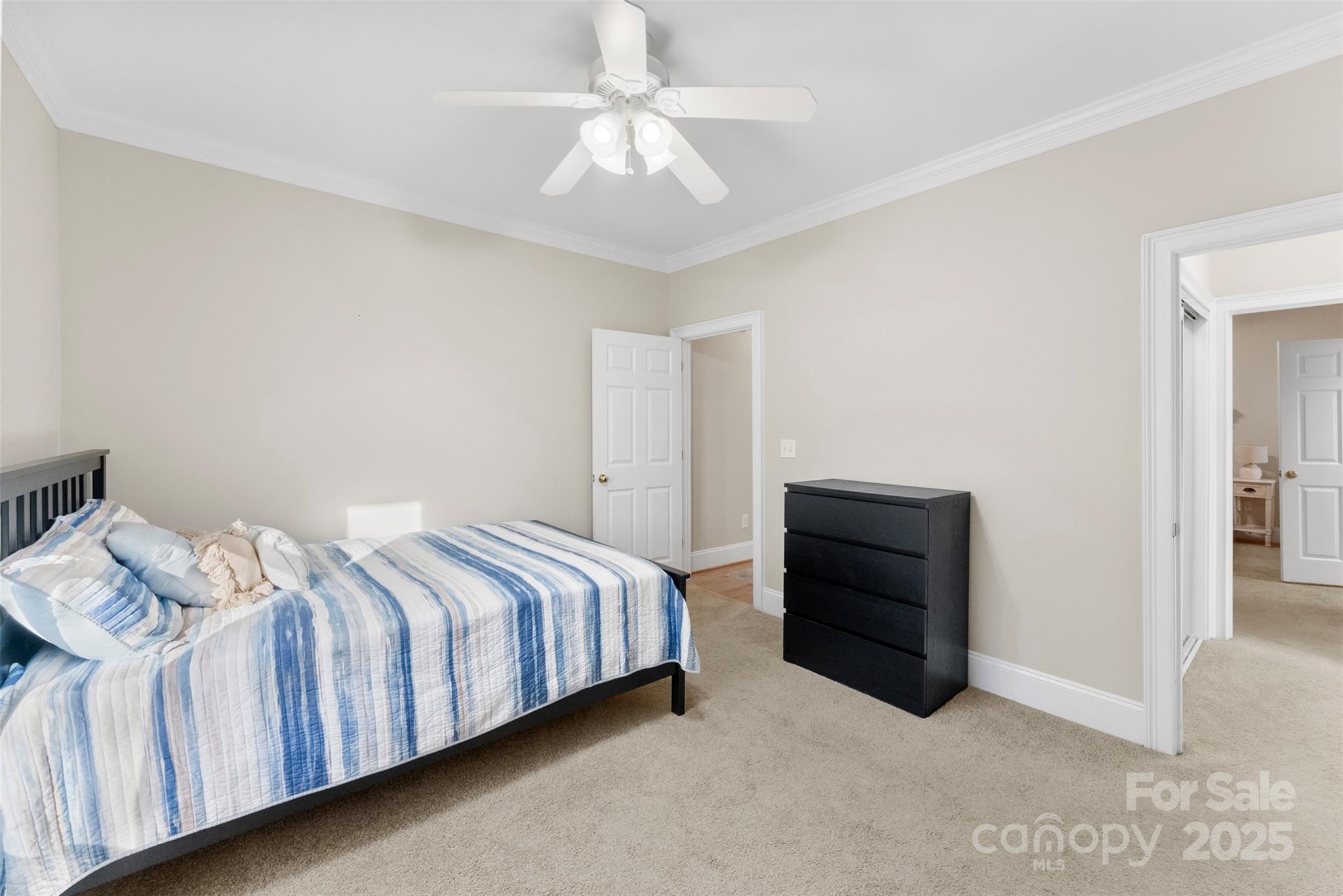 909 South Main Street Clover, SC 29710 - Photo 21 of 26 a bedroom with a bed and a ceiling fan