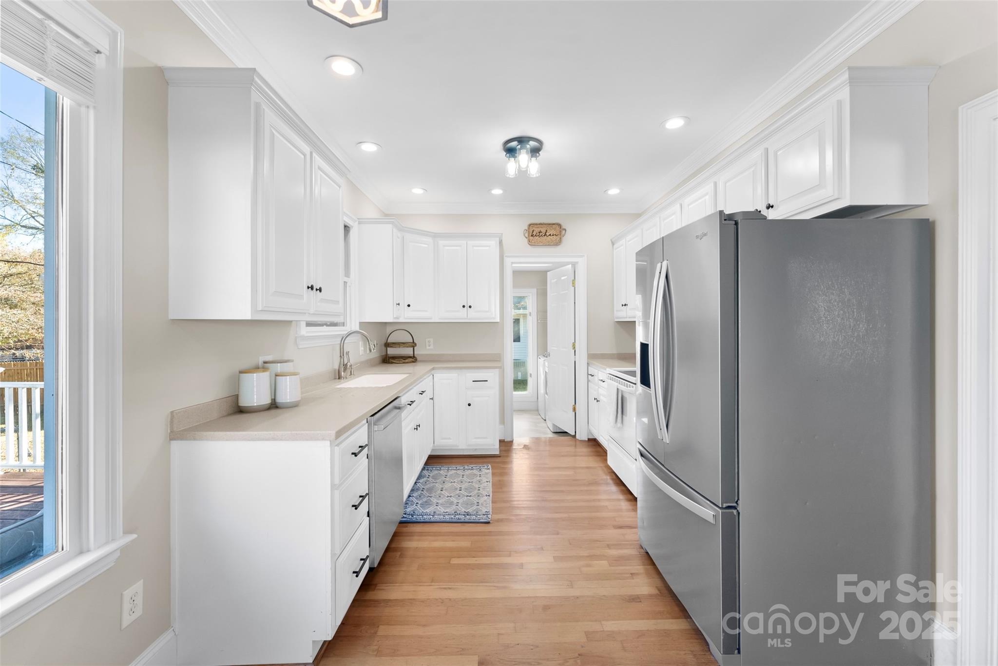 909 South Main Street Clover, SC 29710 - Photo 9 of 26 a kitchen with stainless steel appliances granite countertop a refrigerator and a sink