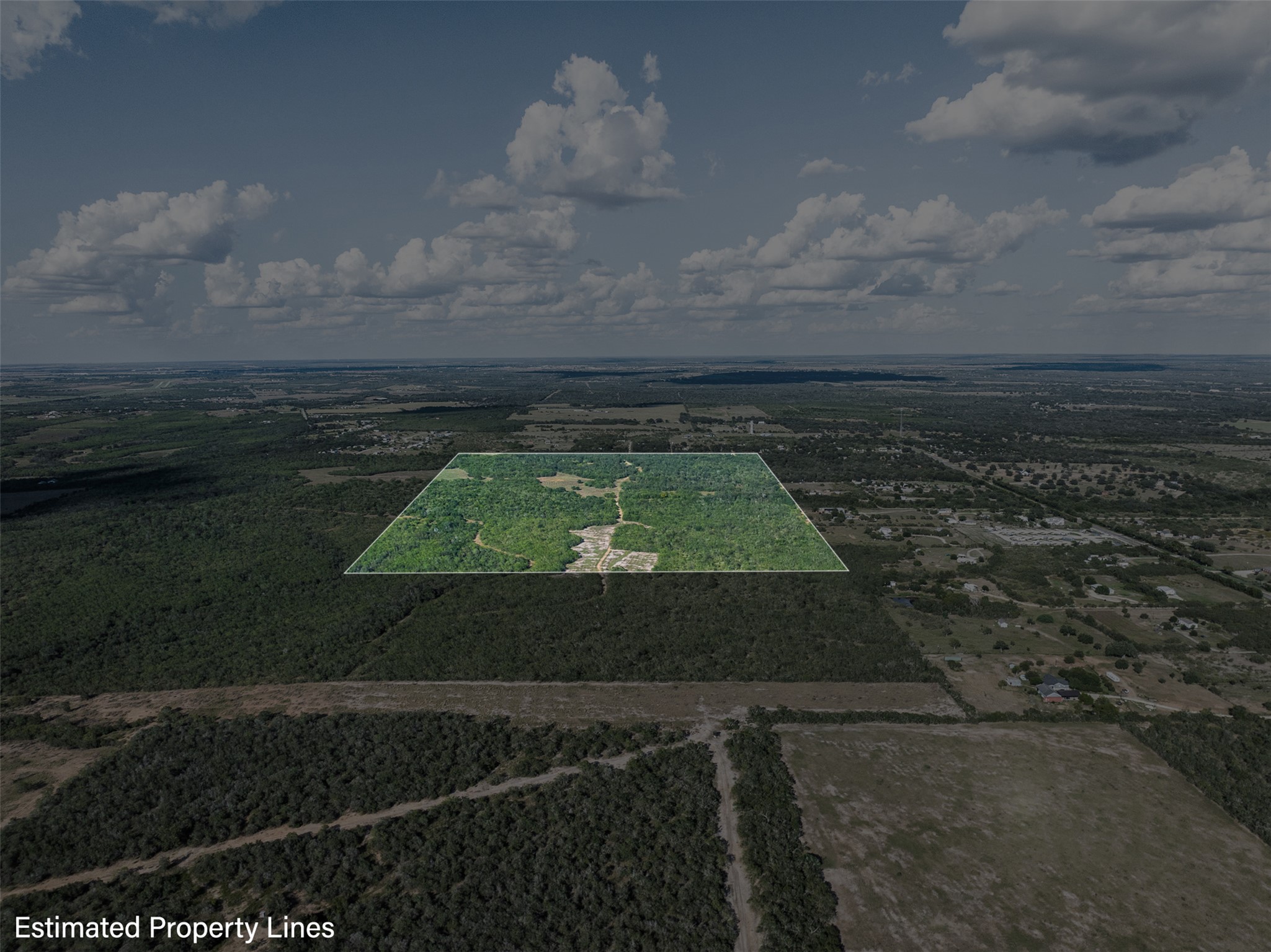 399 Seals Creek Road Lockhart, TX 78644 - Photo 38 of 40 Aerial view of sparsely populated area featuring property parcel outlined