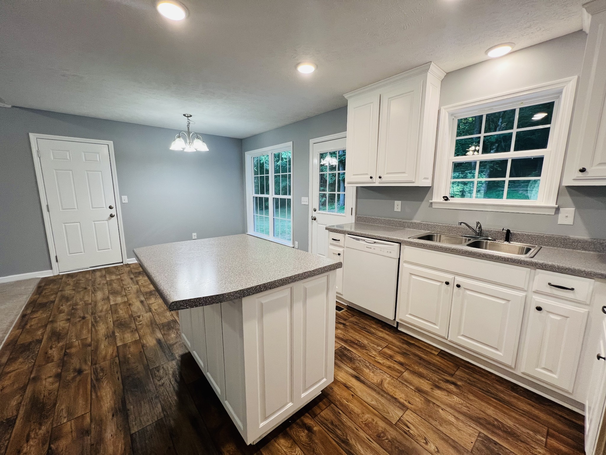 770 Bunker Hill Road Pulaski, TN 38478 - Photo 6 of 26 a kitchen with a sink and cabinets