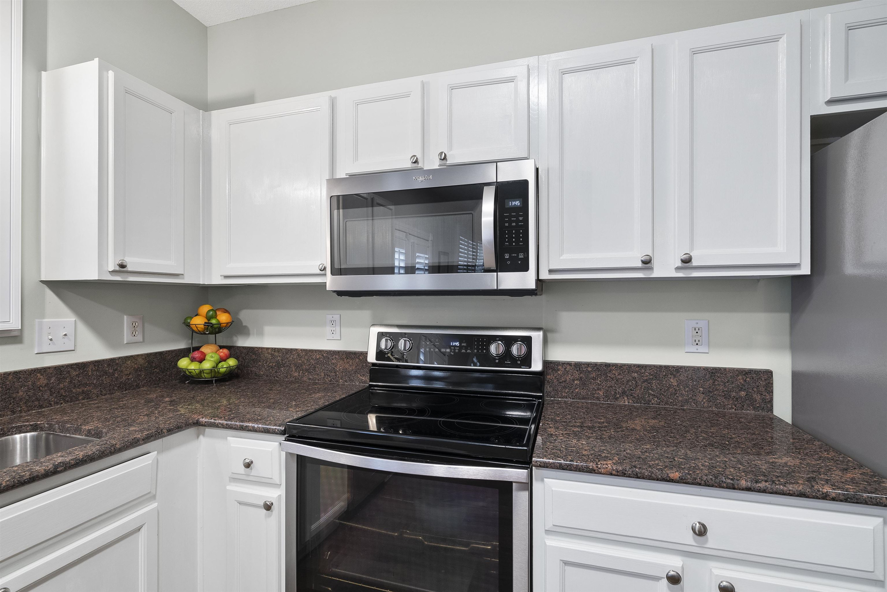 408 Chancellors Ridge Drive Durham, NC 27713 - Photo 13 of 34 a kitchen with stainless steel appliances granite countertop white cabinets and a stove a oven with granite countertops