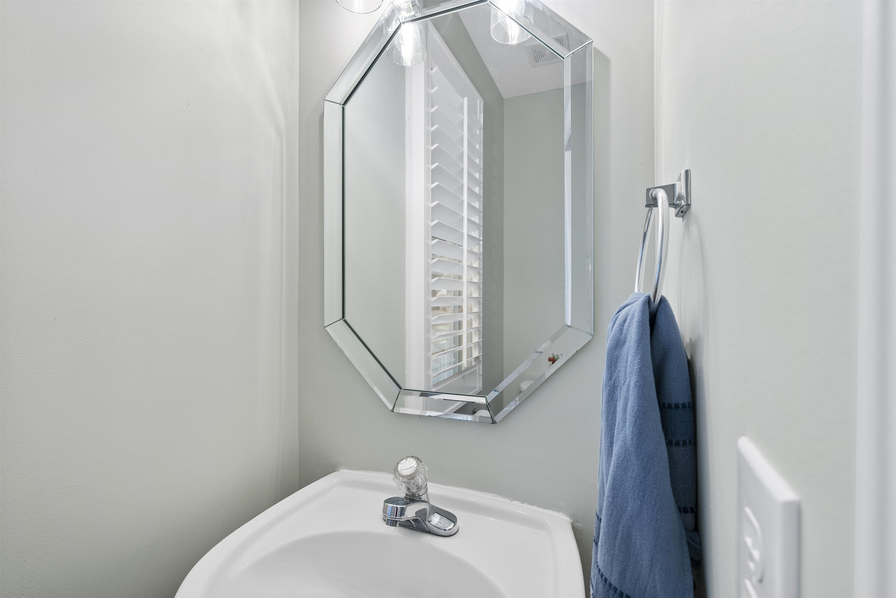 408 Chancellors Ridge Drive Durham, NC 27713 - Photo 15 of 34 a bathroom with a sink and mirror with toilet