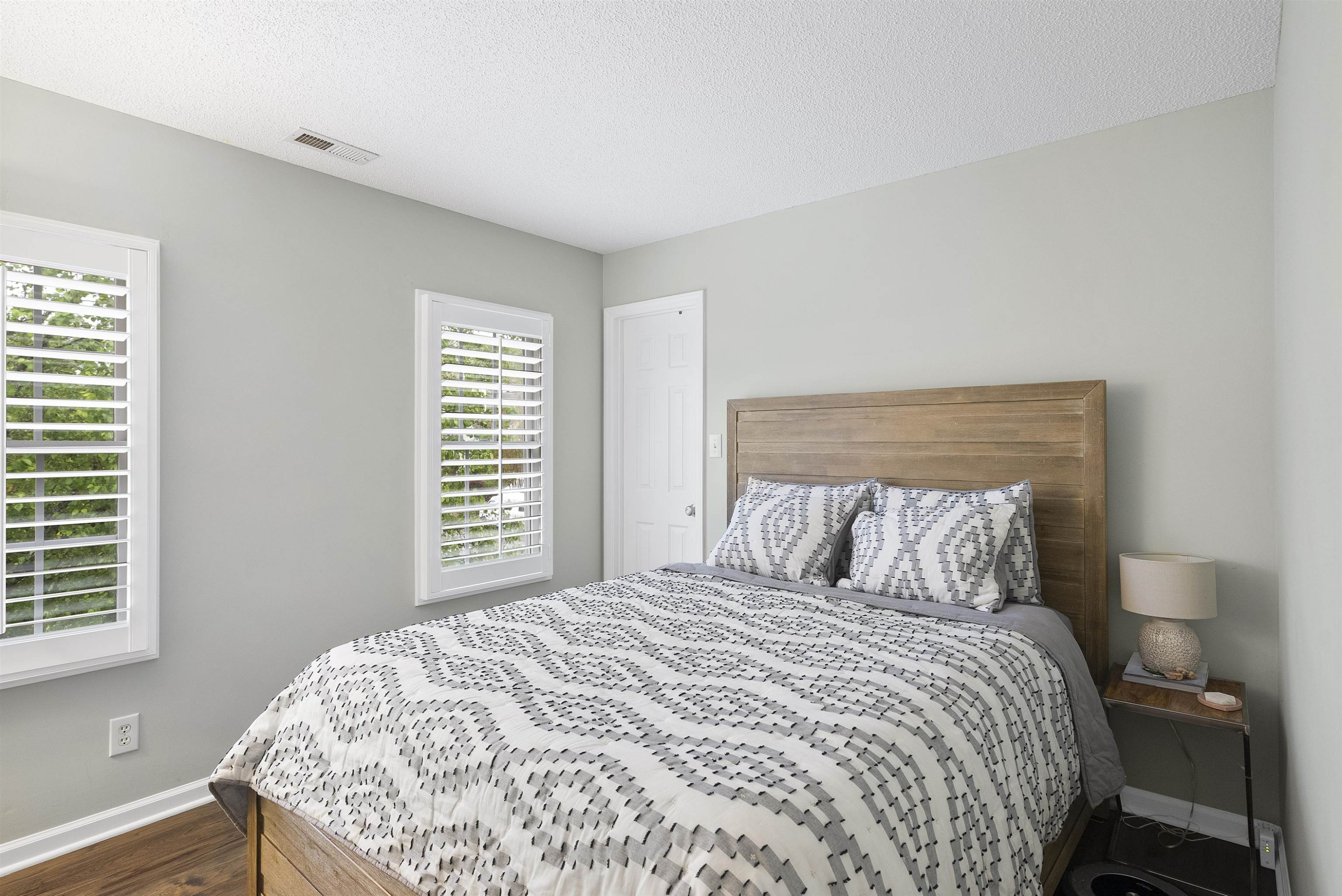 408 Chancellors Ridge Drive Durham, NC 27713 - Photo 17 of 34 a bedroom with a bed and a window