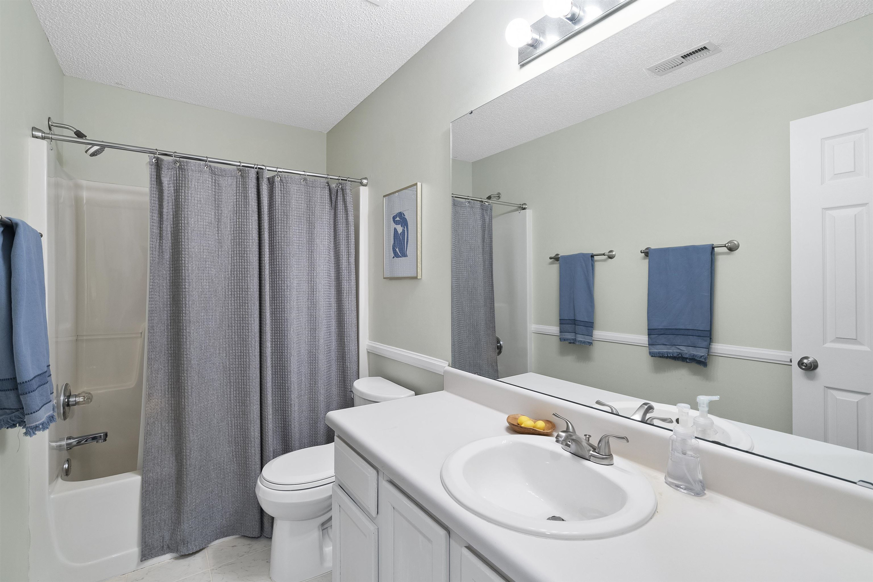 408 Chancellors Ridge Drive Durham, NC 27713 - Photo 20 of 34 a bathroom with a sink toilet and shower