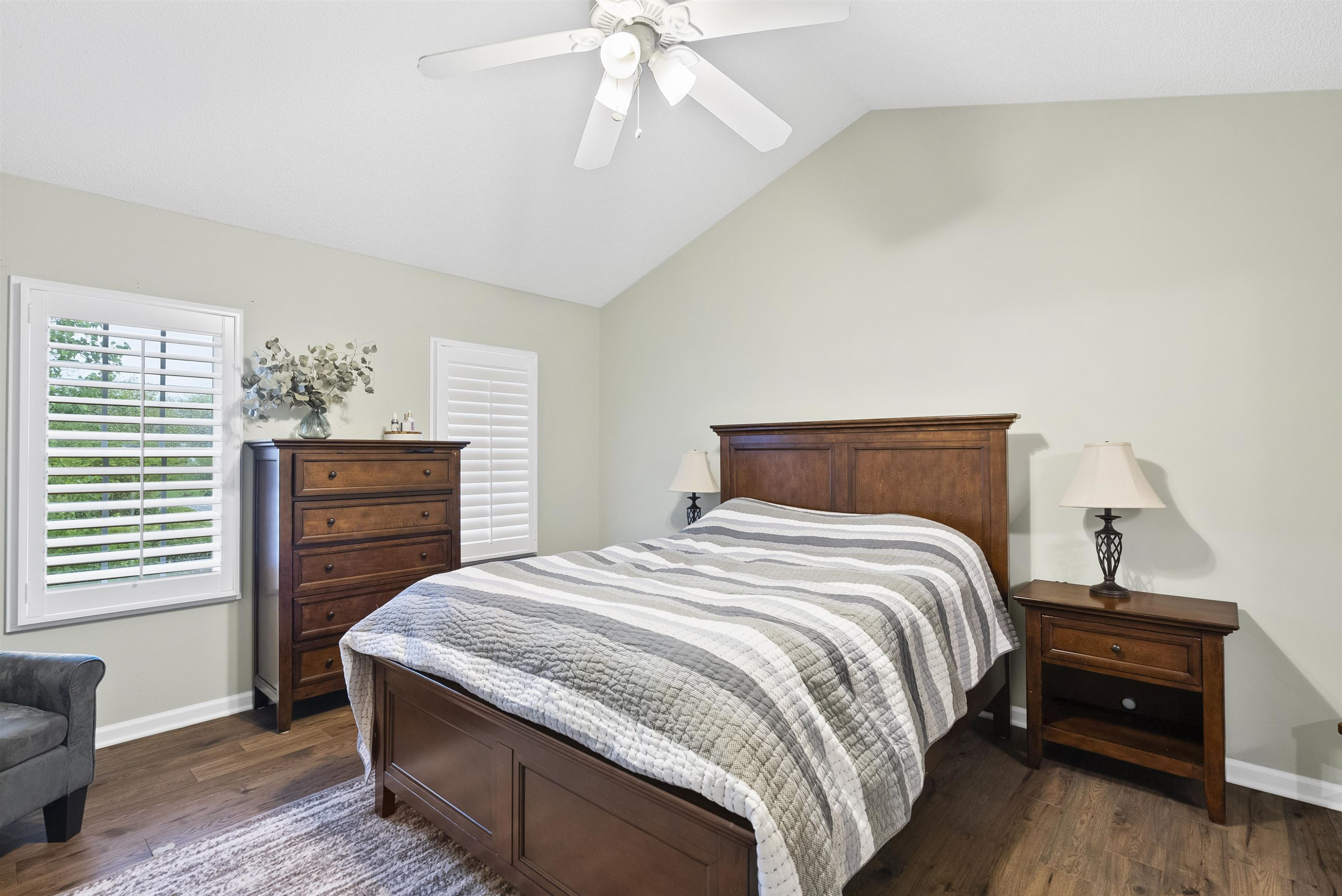 408 Chancellors Ridge Drive Durham, NC 27713 - Photo 22 of 34 a bedroom with a bed and a chandelier