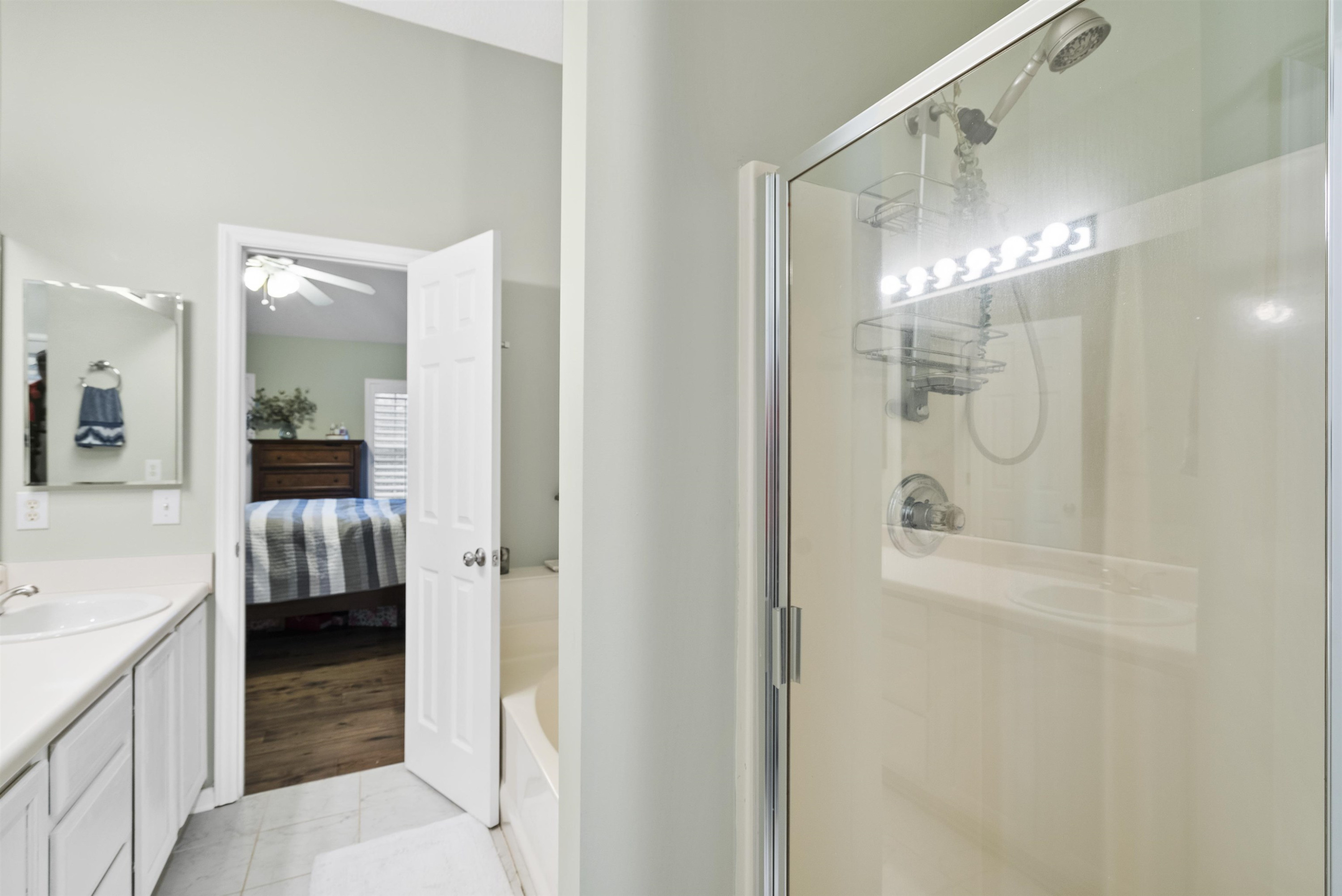 408 Chancellors Ridge Drive Durham, NC 27713 - Photo 27 of 34 a bathroom with a glass shower door