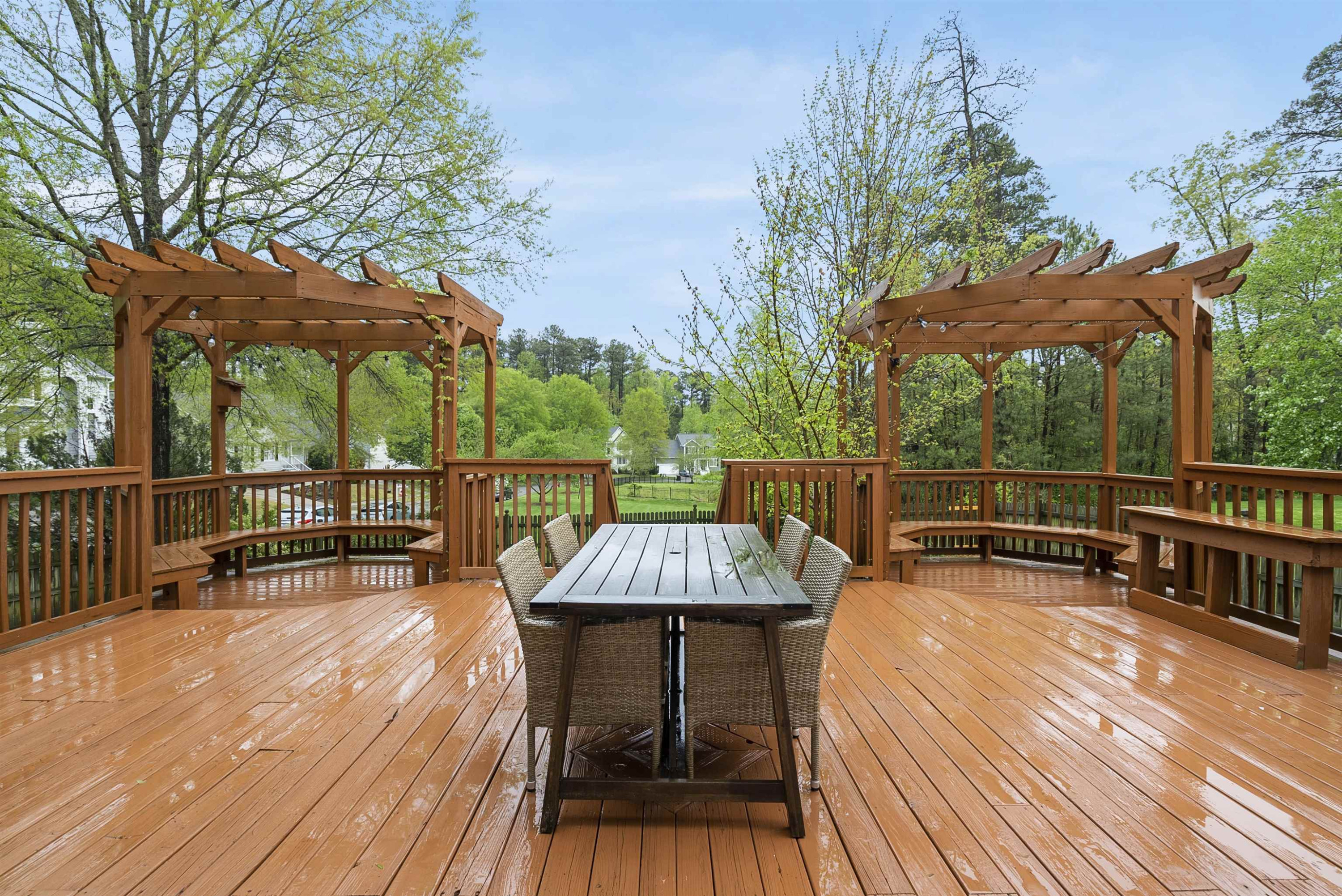 408 Chancellors Ridge Drive Durham, NC 27713 - Photo 28 of 34 a view of a balcony with wooden floor and outdoor seating