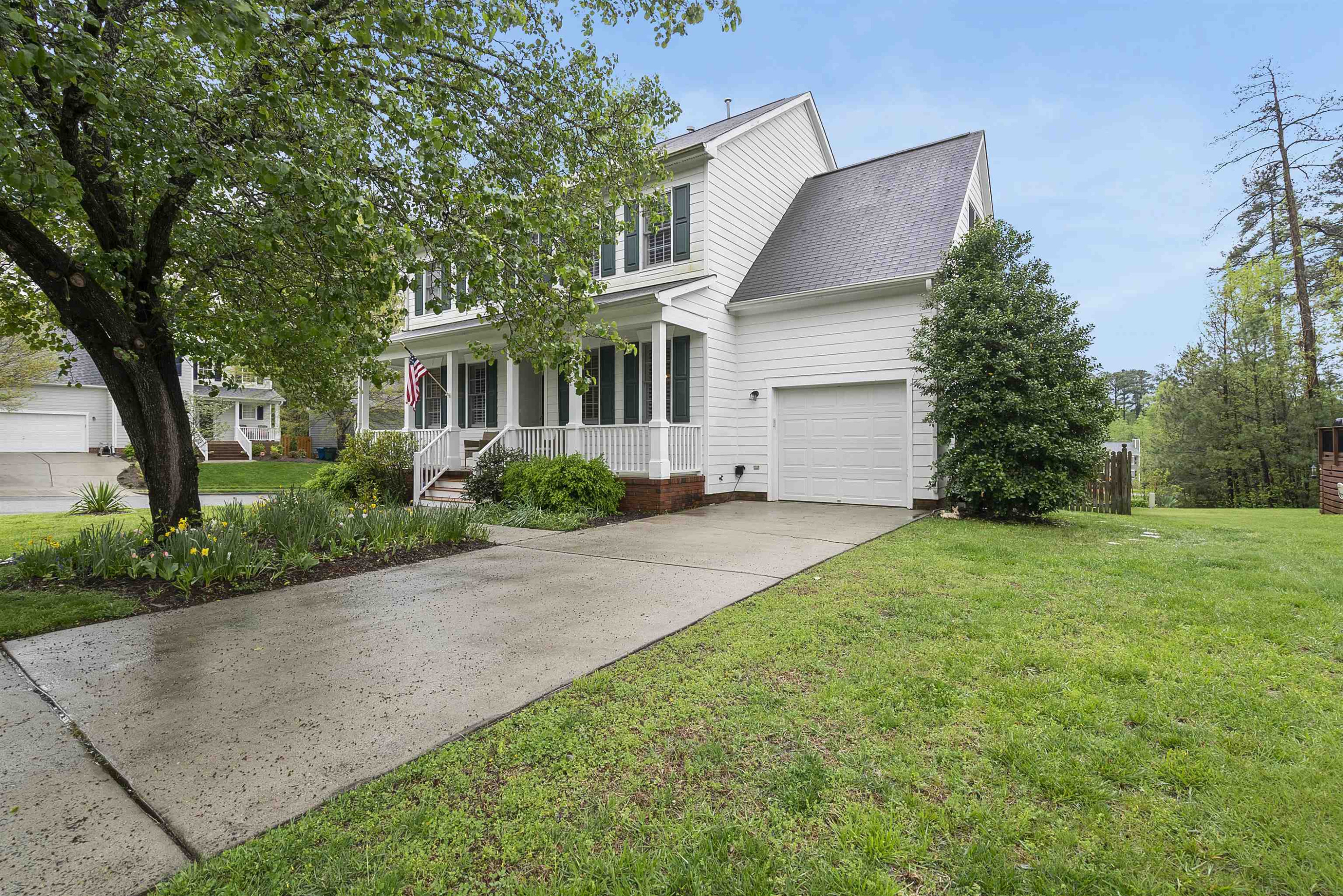 408 Chancellors Ridge Drive Durham, NC 27713 - Photo 3 of 34 a view of backyard of house with green space