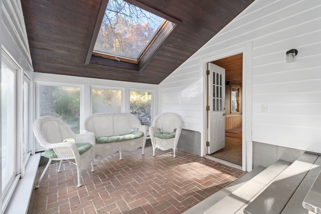 21 Francis Avenue Groveland, MA 01834 - Photo 12 of 29 a living room with furniture a rug and a large window