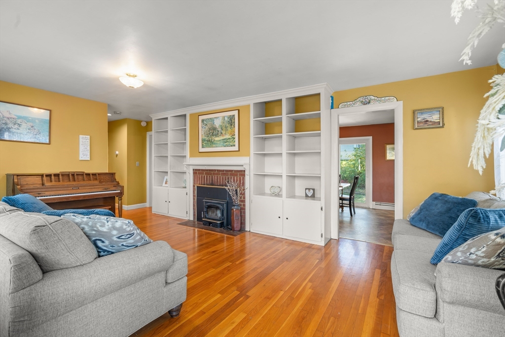 21 Francis Avenue Groveland, MA 01834 - Photo 14 of 29 a living room with furniture and a fireplace