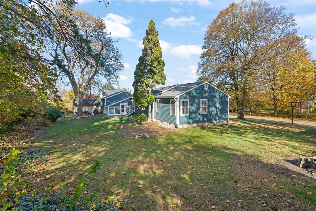 21 Francis Avenue Groveland, MA 01834 - Photo 4 of 29 a front view of house with yard