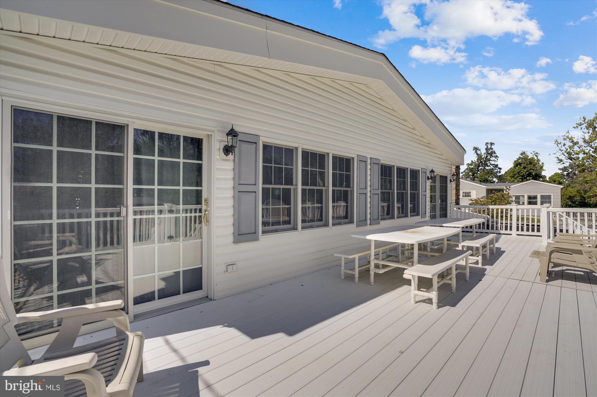 1225 North Rolling Road Baltimore, MD 21228 - Photo 7 of 49 Huge deck adjacent to an amazing great room.