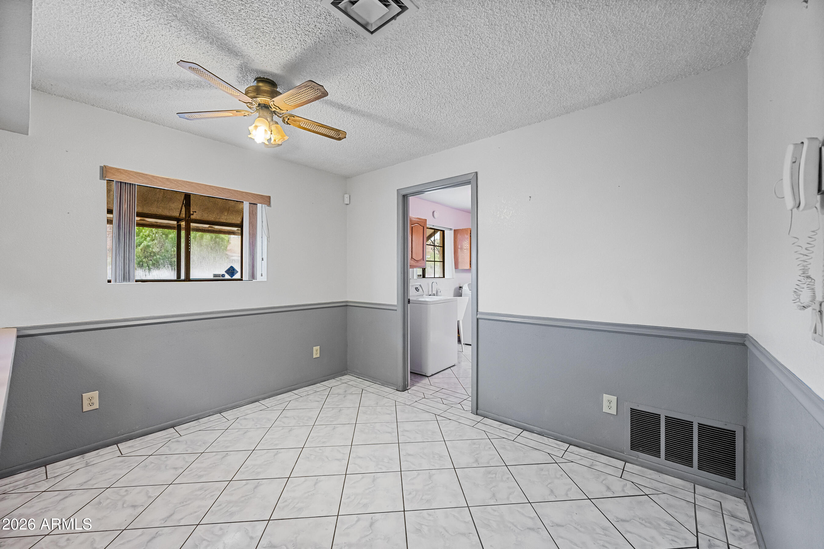 7358 Alamo Way Globe, AZ 85501 - Photo 26 of 68 a view of a livingroom with a ceiling fan and window