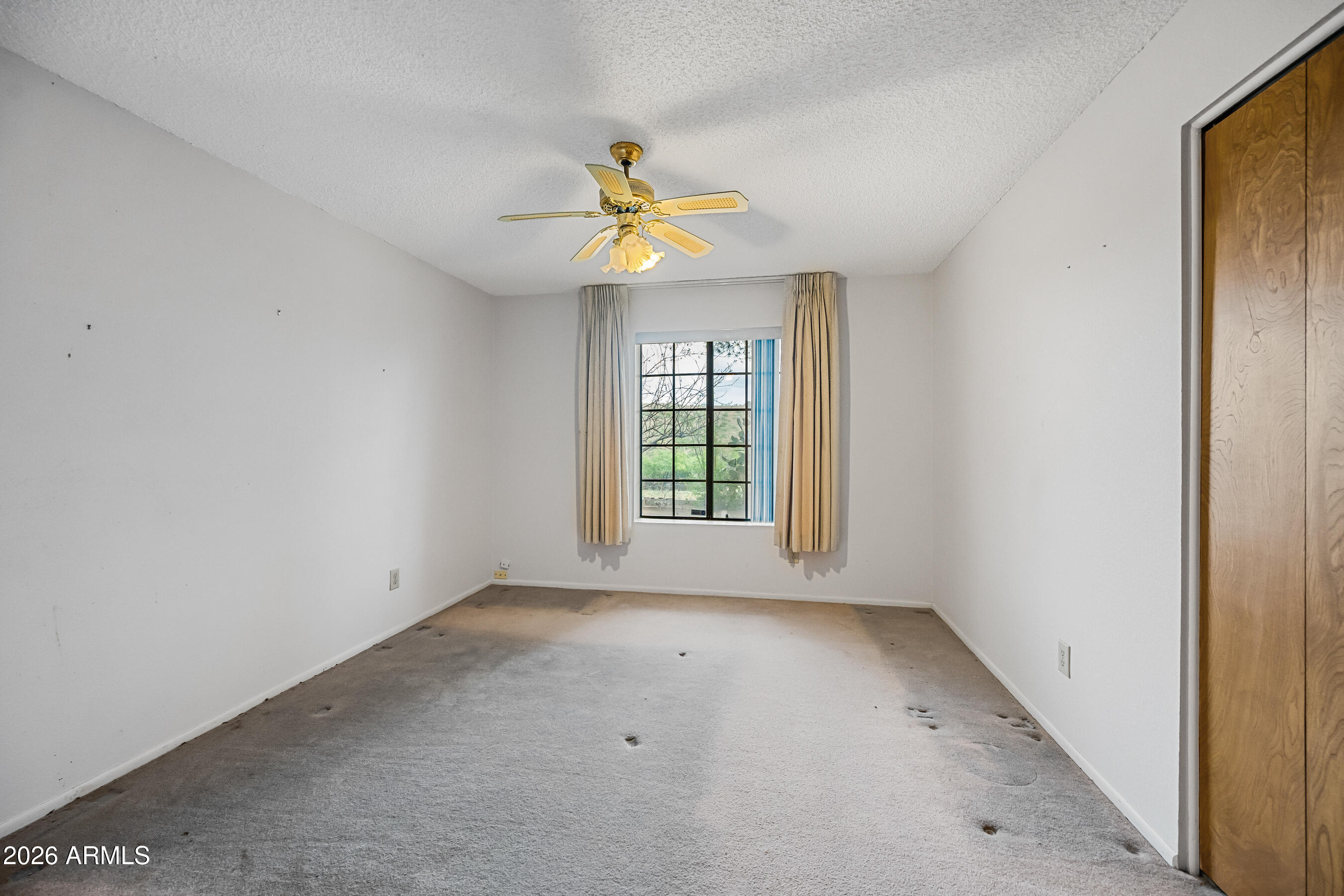 7358 Alamo Way Globe, AZ 85501 - Photo 35 of 68 a view of an empty room with a window