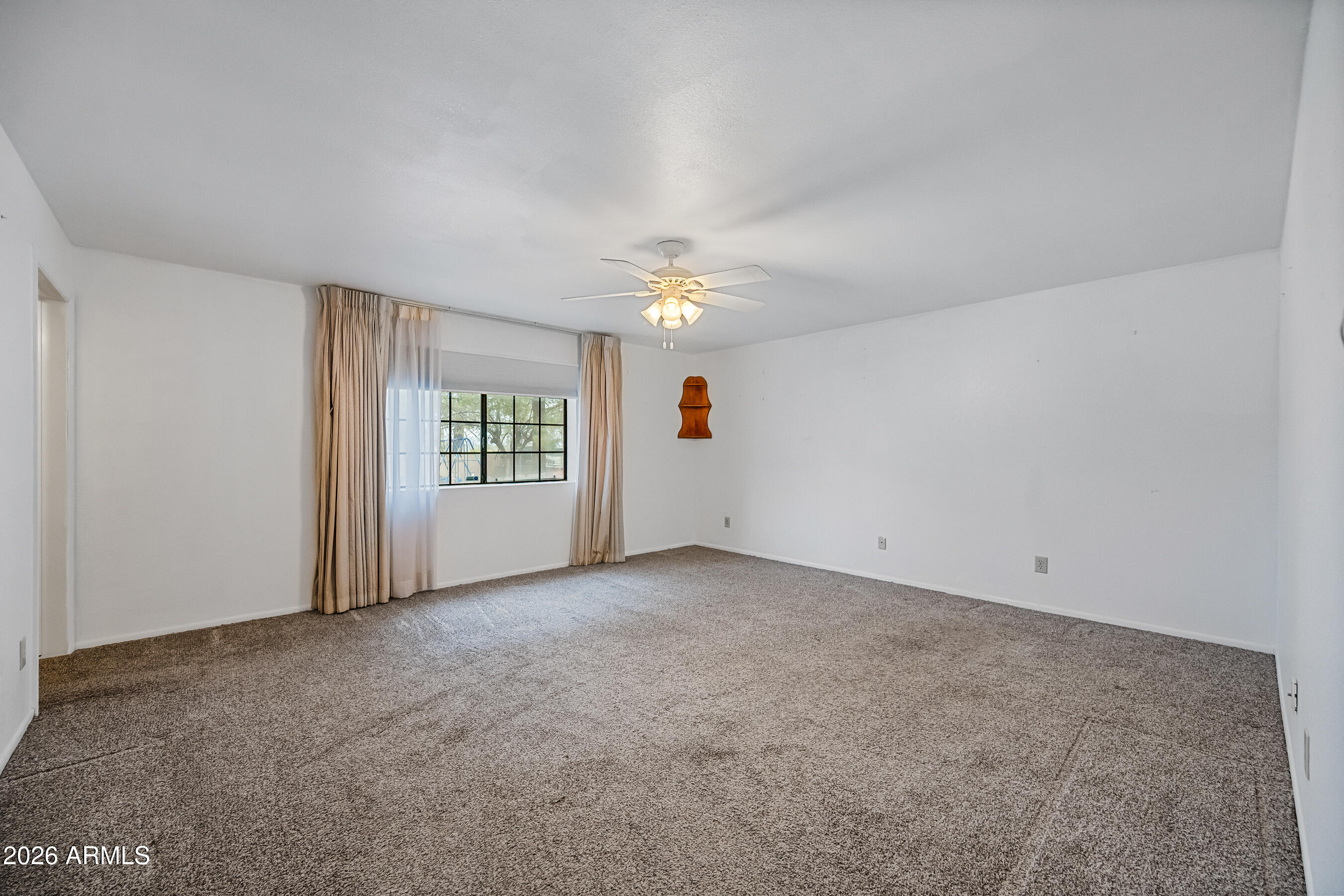 7358 Alamo Way Globe, AZ 85501 - Photo 42 of 68 a view of an empty room with a window