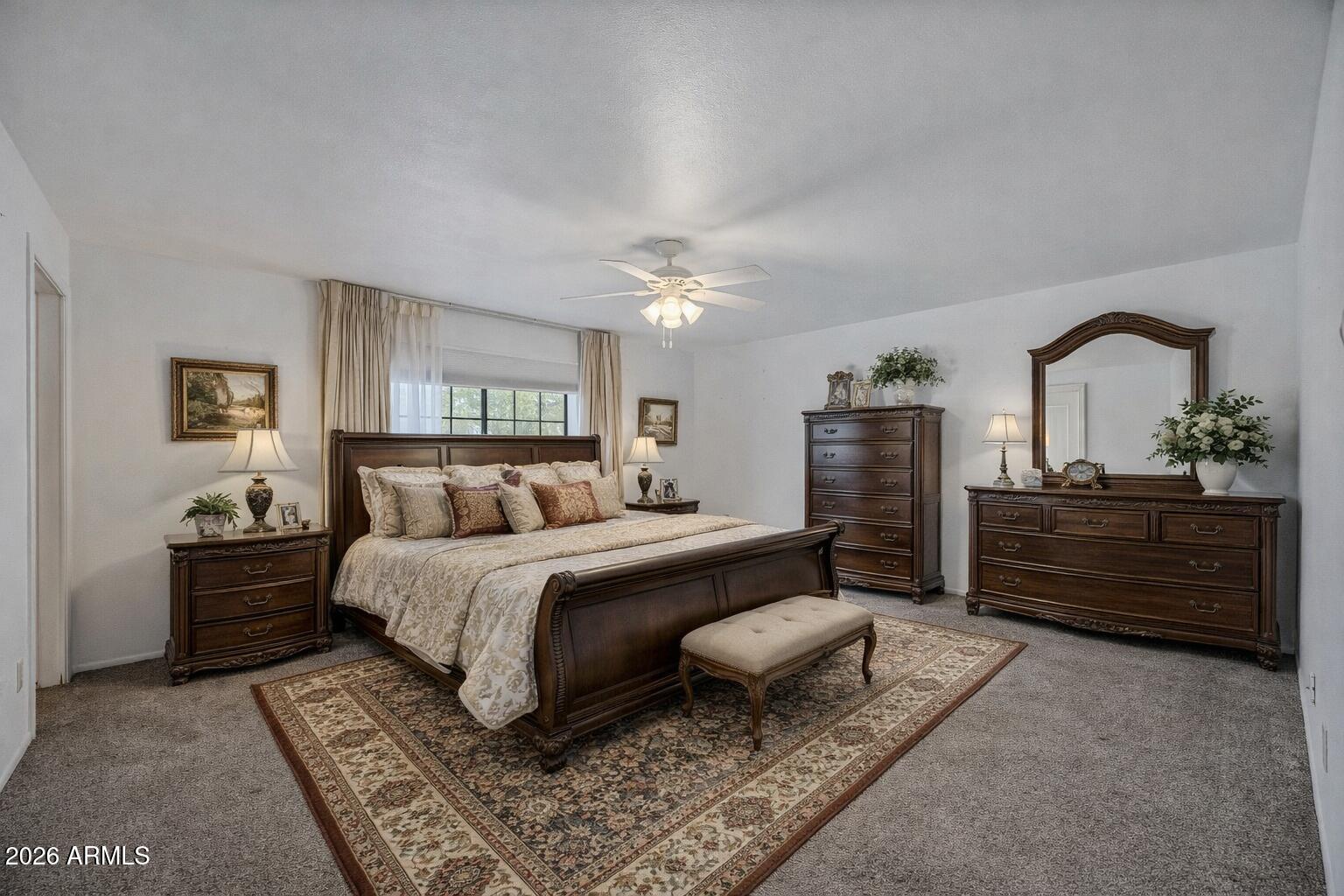 7358 Alamo Way Globe, AZ 85501 - Photo 43 of 68 a bed room with a bed window and a dresser
