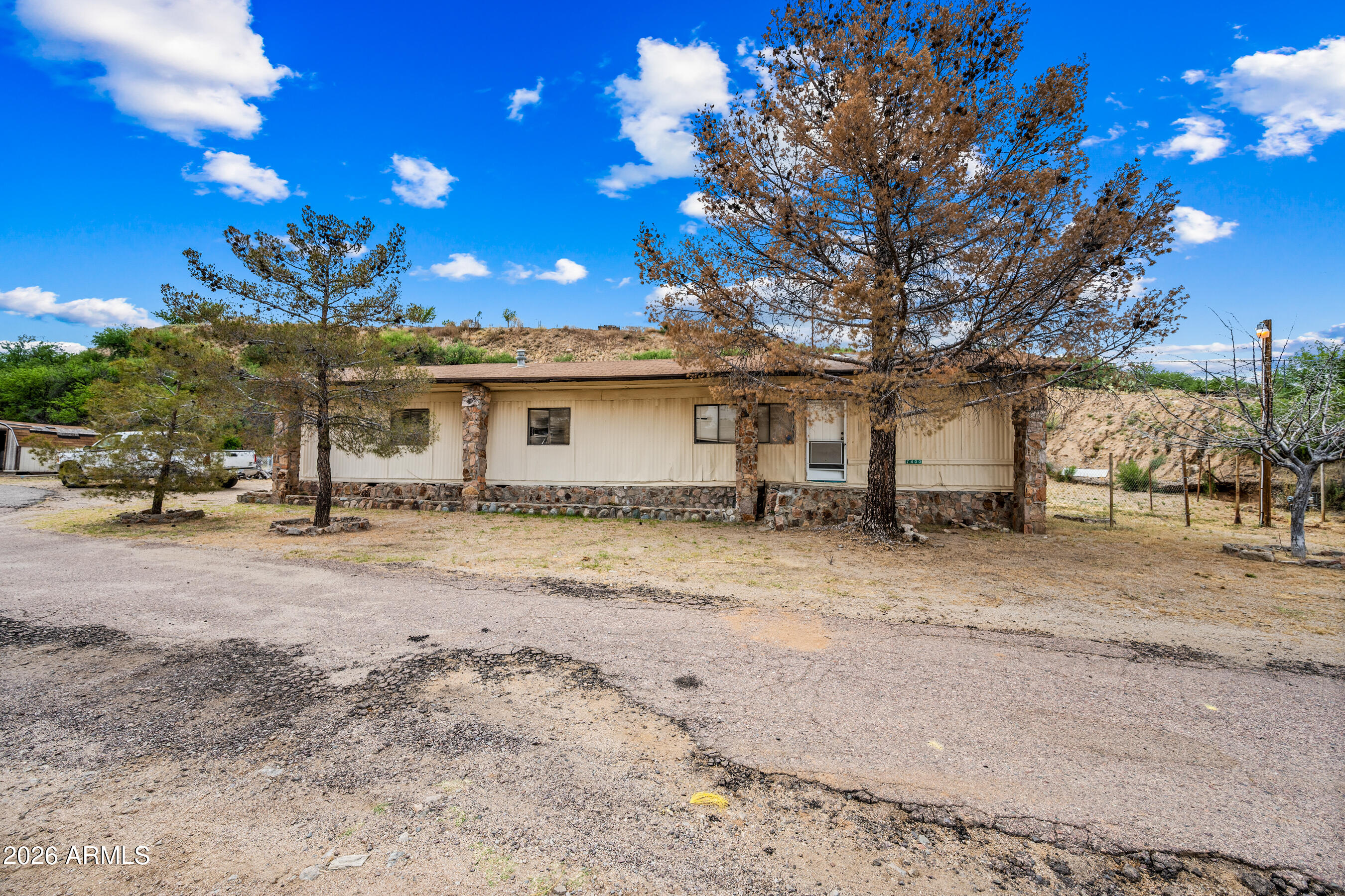 7358 Alamo Way Globe, AZ 85501 - Photo 56 of 68 a view of a house with a yard