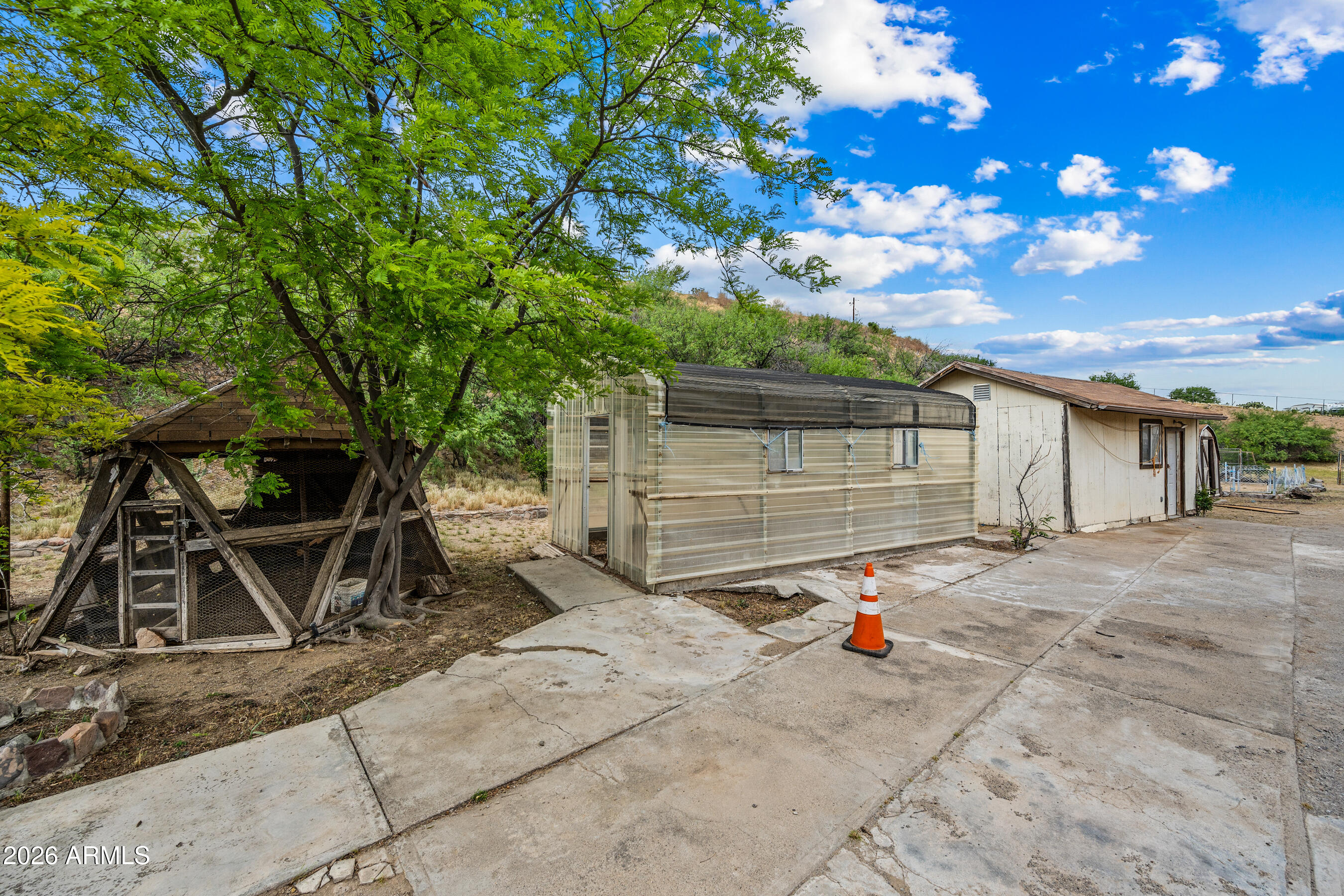 7358 Alamo Way Globe, AZ 85501 - Photo 60 of 68 a backyard of a house with table and chairs