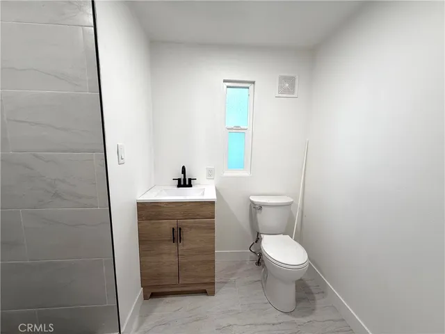 a bathroom with a sink a shower