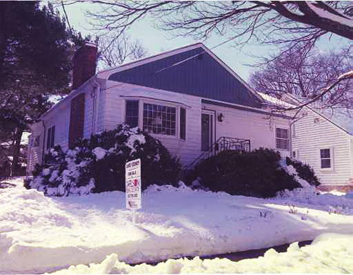 23 Conant Road Brookline, MA 02467 - Photo 1 of 1 a front view of a house with a yard