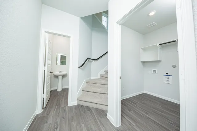 a view of entryway with wooden floor
