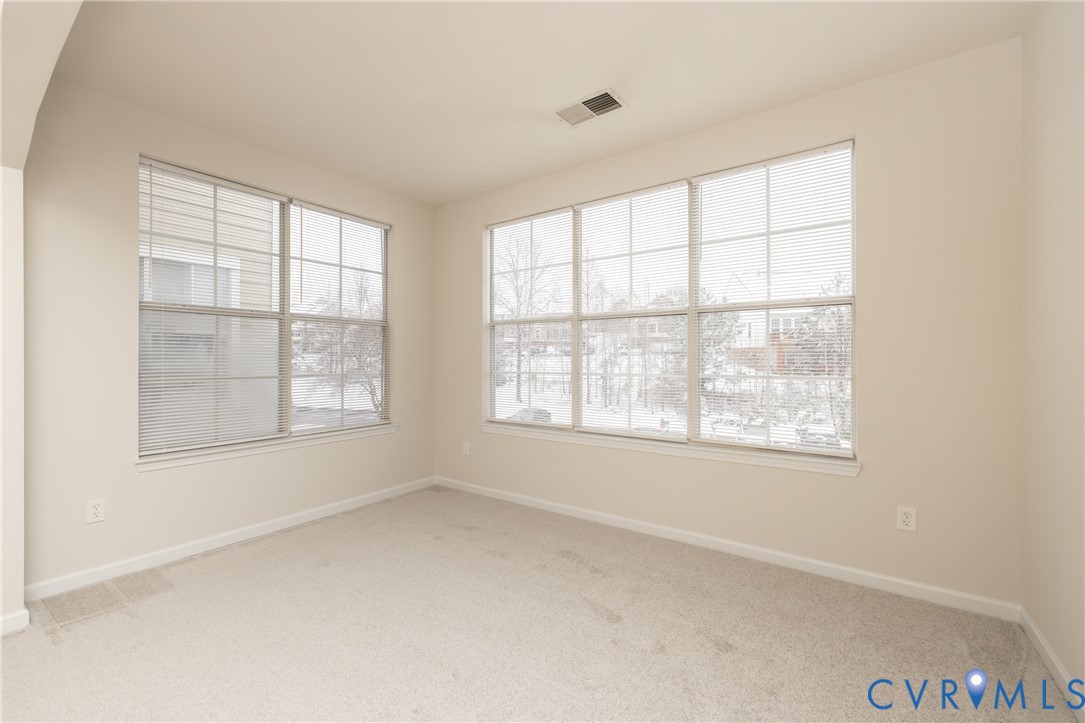 734 Bristol Village Drive, Unit 208 Midlothian, VA 23114 - Photo 15 of 24 an empty room with a window
