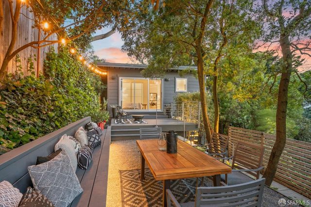 a view of a garden with patio