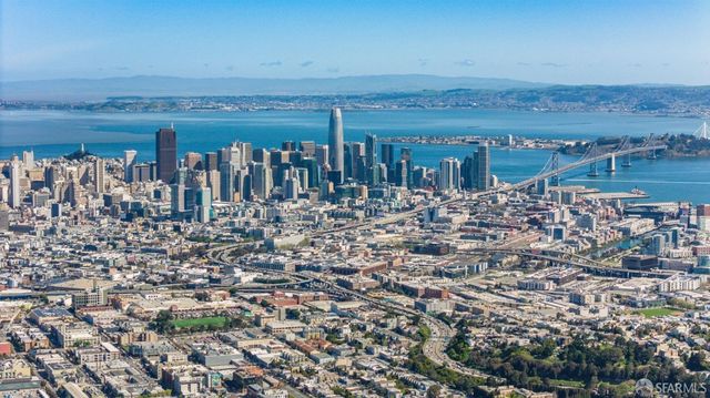 a view of city and mountain