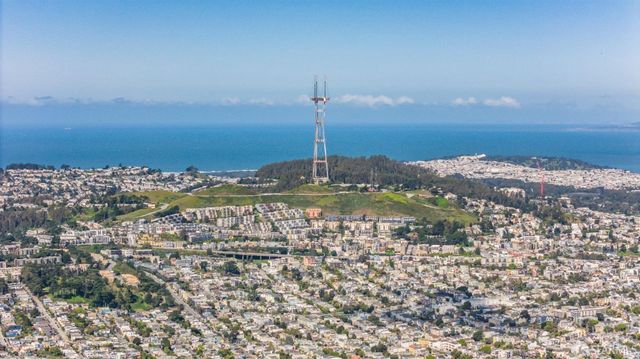 an aerial view of residential house with parking space