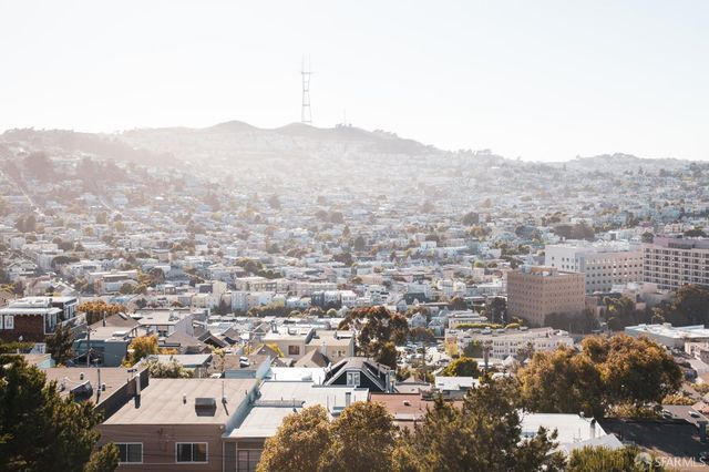 a group of people sitting outside of a area