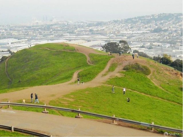 a store filled with lots of fruit and vegetables