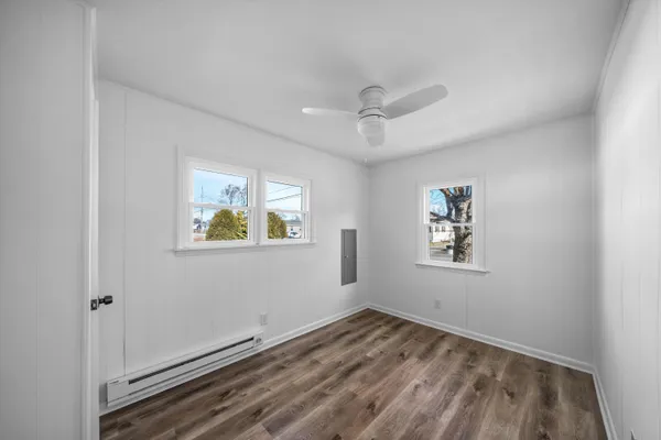 a view of empty room with windows