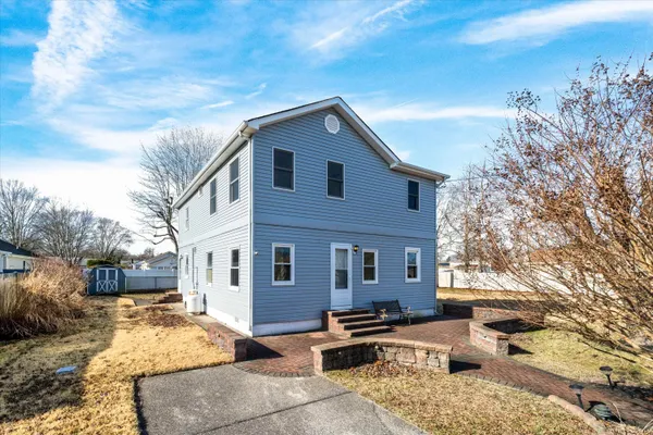 a view of a house with a patio