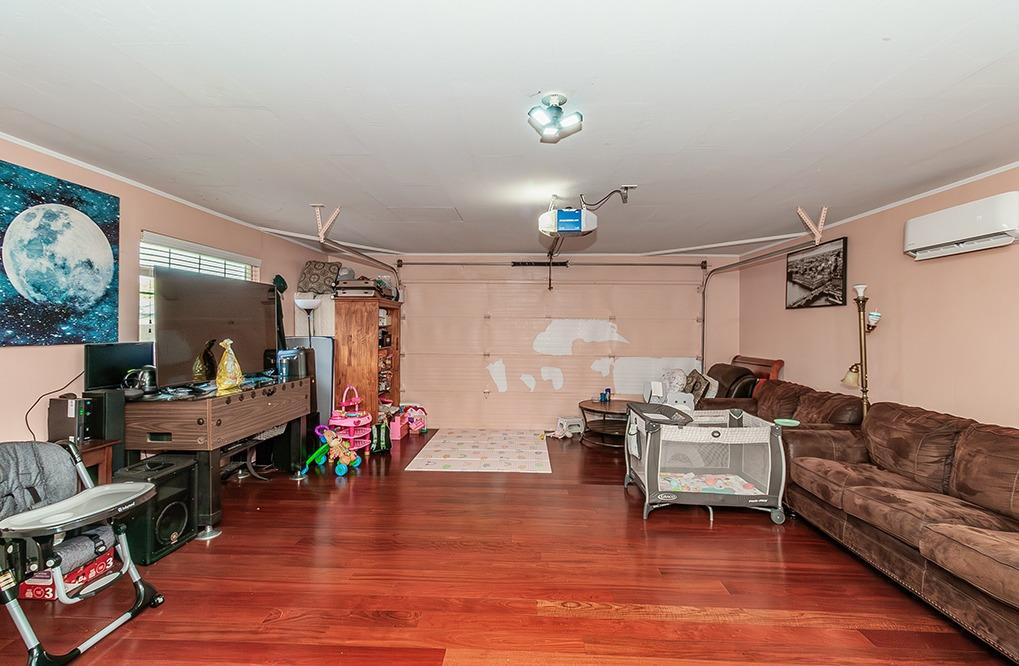 3012 Stanford Avenue Clovis, CA 93611 - Photo 23 of 41 a living room with furniture and a flat screen tv