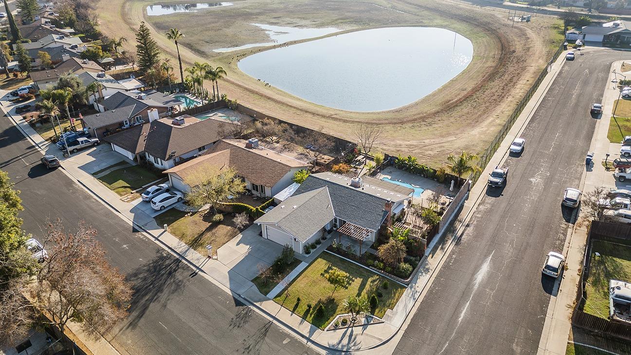 3012 Stanford Avenue Clovis, CA 93611 - Photo 41 of 41 an aerial view of a house with a swimming pool and outdoor seating