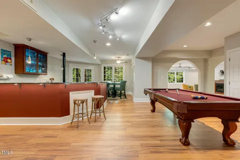 a kitchen with stainless steel appliances granite countertop a sink and a stove