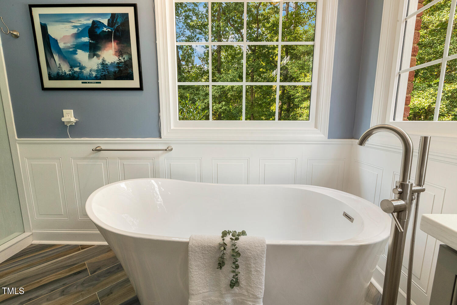 1505 October Road Raleigh, NC 27614 - Photo 25 of 76 a white bath tub sitting next to a window