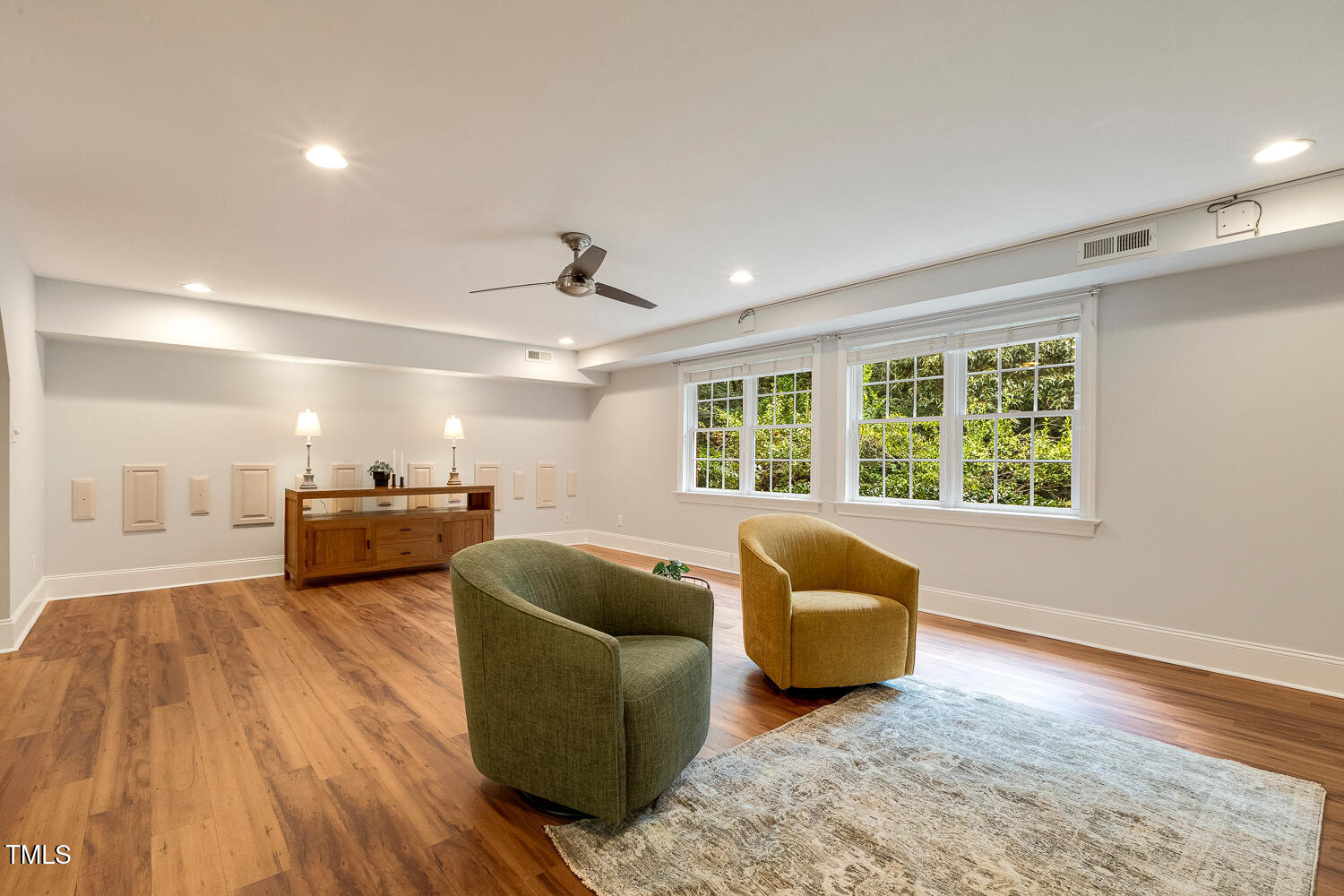 1505 October Road Raleigh, NC 27614 - Photo 45 of 76 a living room with furniture and a window
