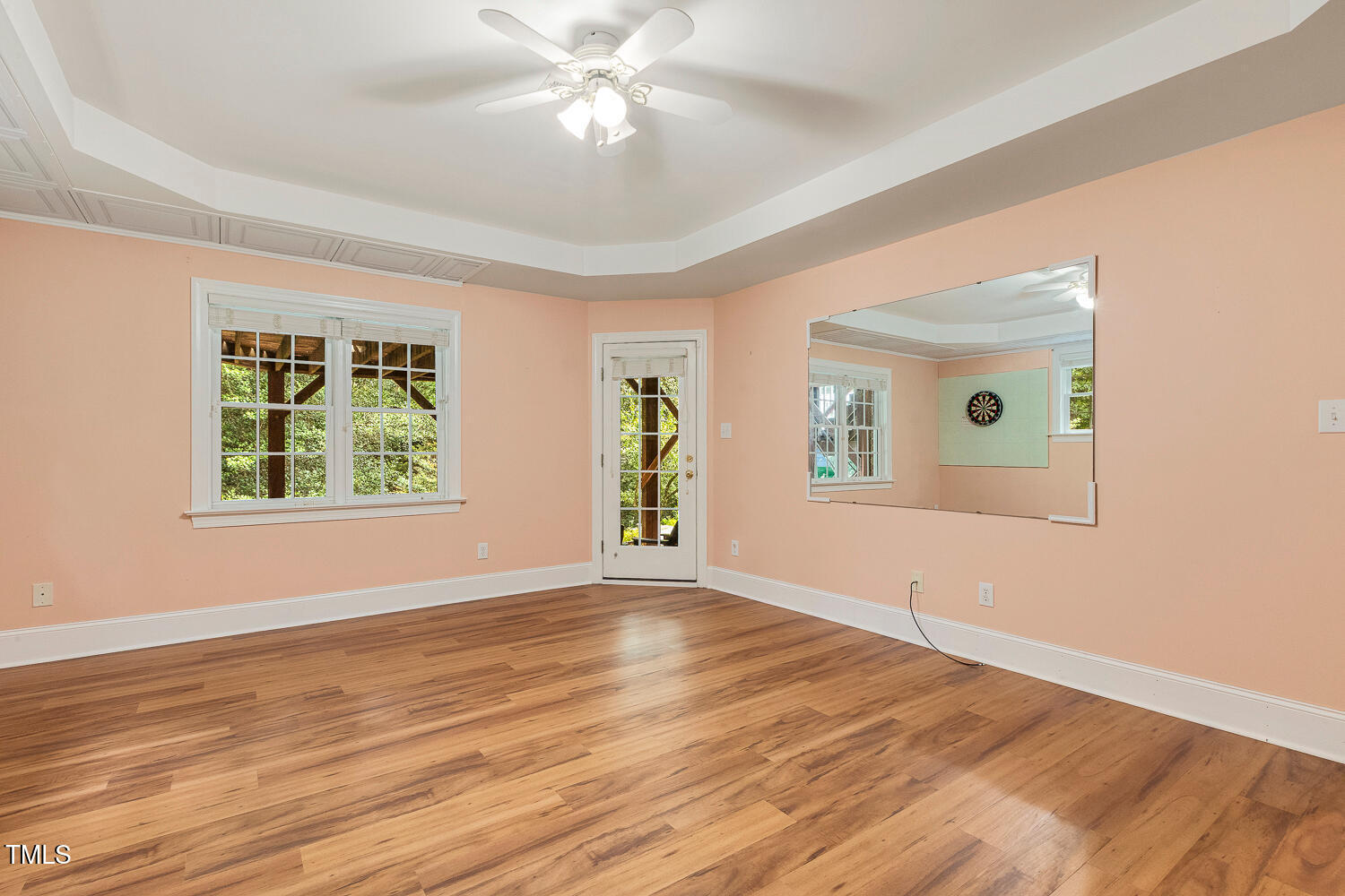 1505 October Road Raleigh, NC 27614 - Photo 48 of 76 a view of an empty room with window and wooden floor